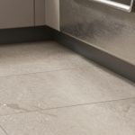 Choosing slip-resistant porcelain tiles for busy kitchen floors near sinks.