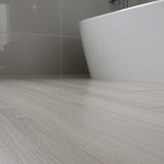 How to select vinyl plank wear layers for moisture-prone bathrooms