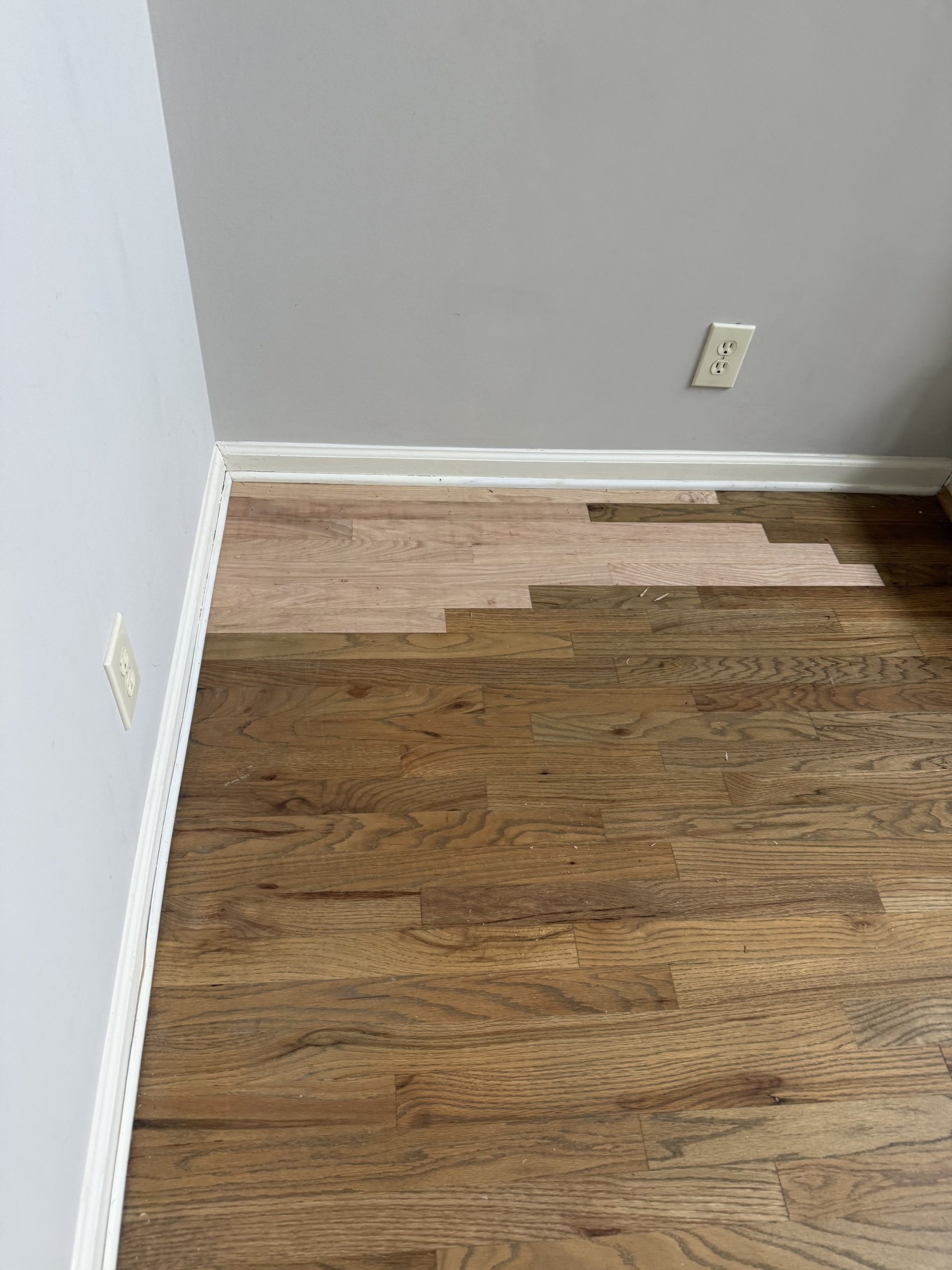 Pet stain Dark spot on hardwood floor